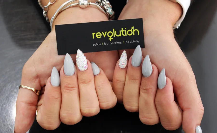 Grey almond nails with sparkle accents